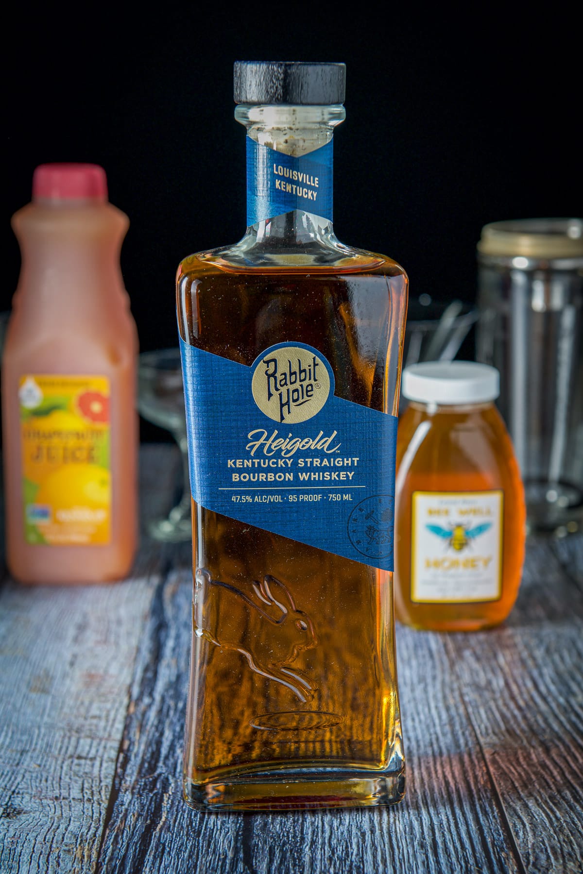 Bourbon, honey and grapefruit on a table