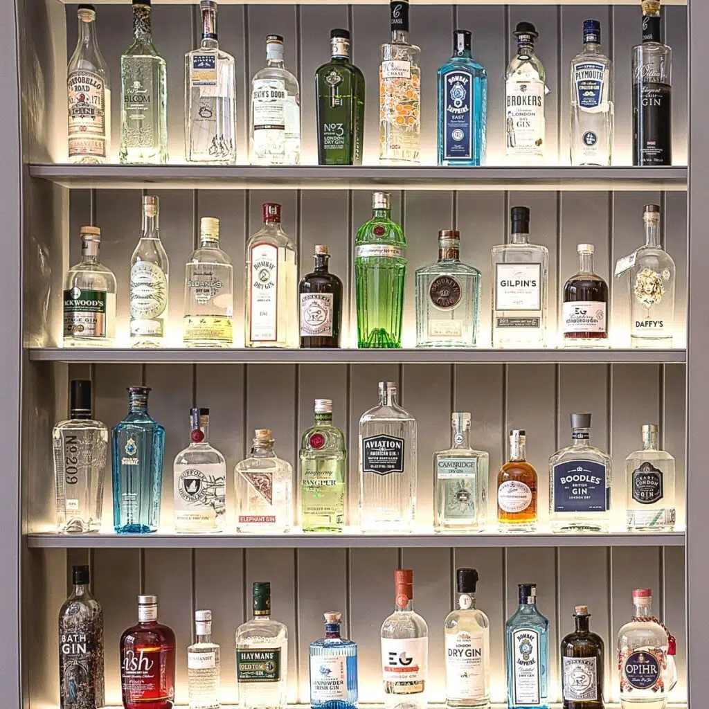 Gin bottles on wooden shelves