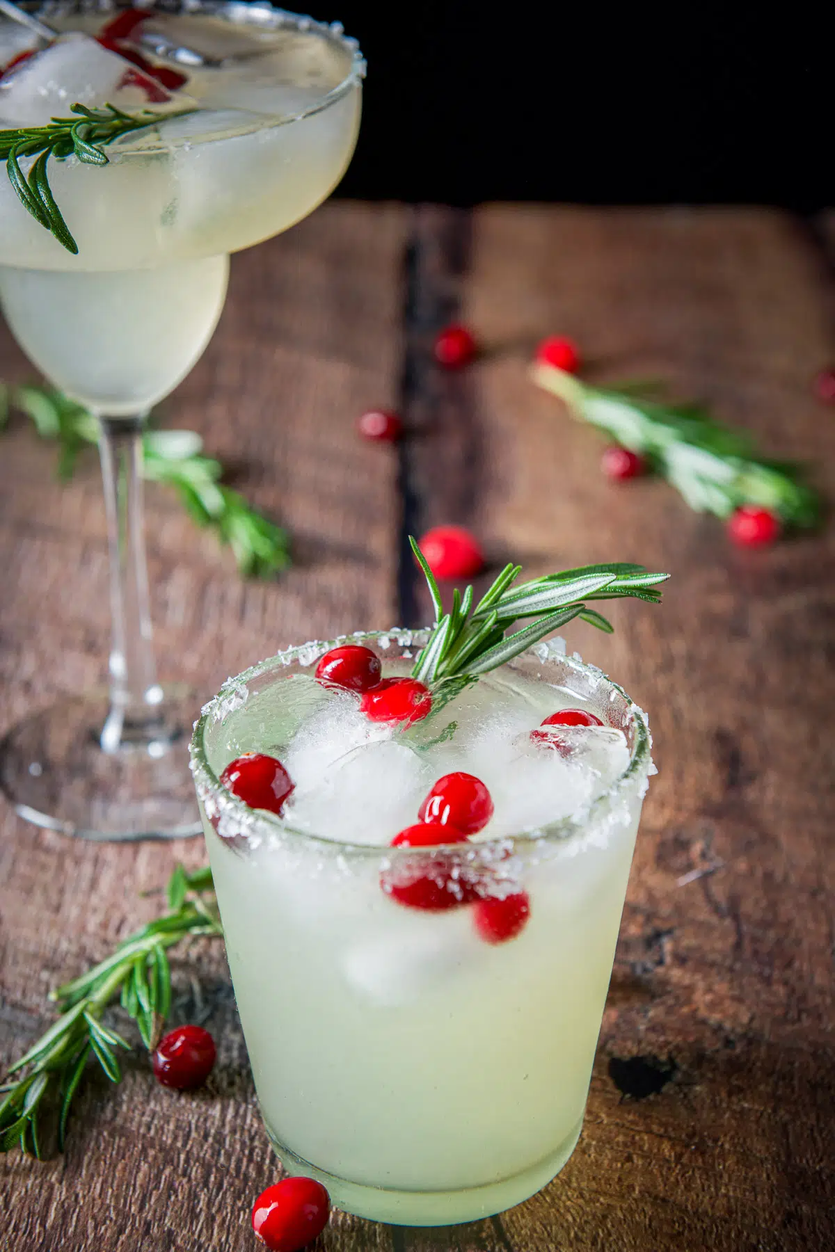 Closer view of the mistletoe margarita with green and red garnish