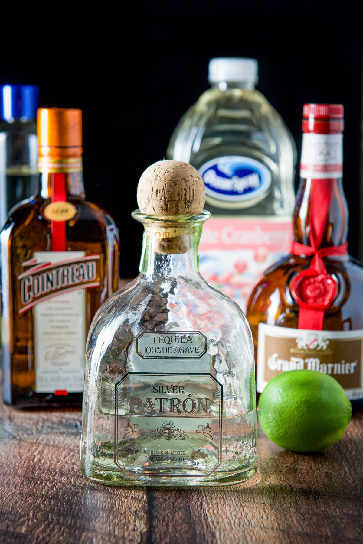 Tequila, lime, Cointreau, GrandMarnier, white cranberry juice and simple syrup