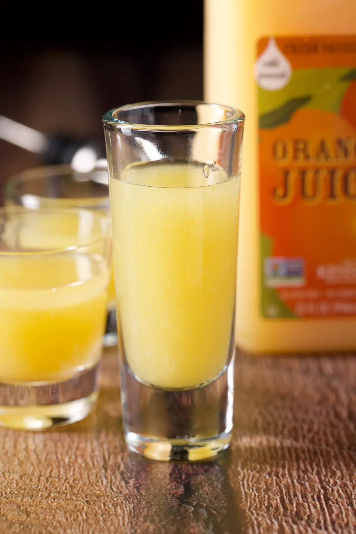 Orange juice poured into the glasses