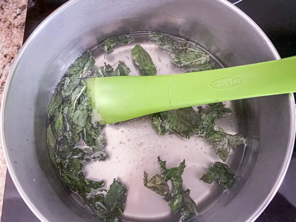 Mint leaves starting to shrivel in the pan