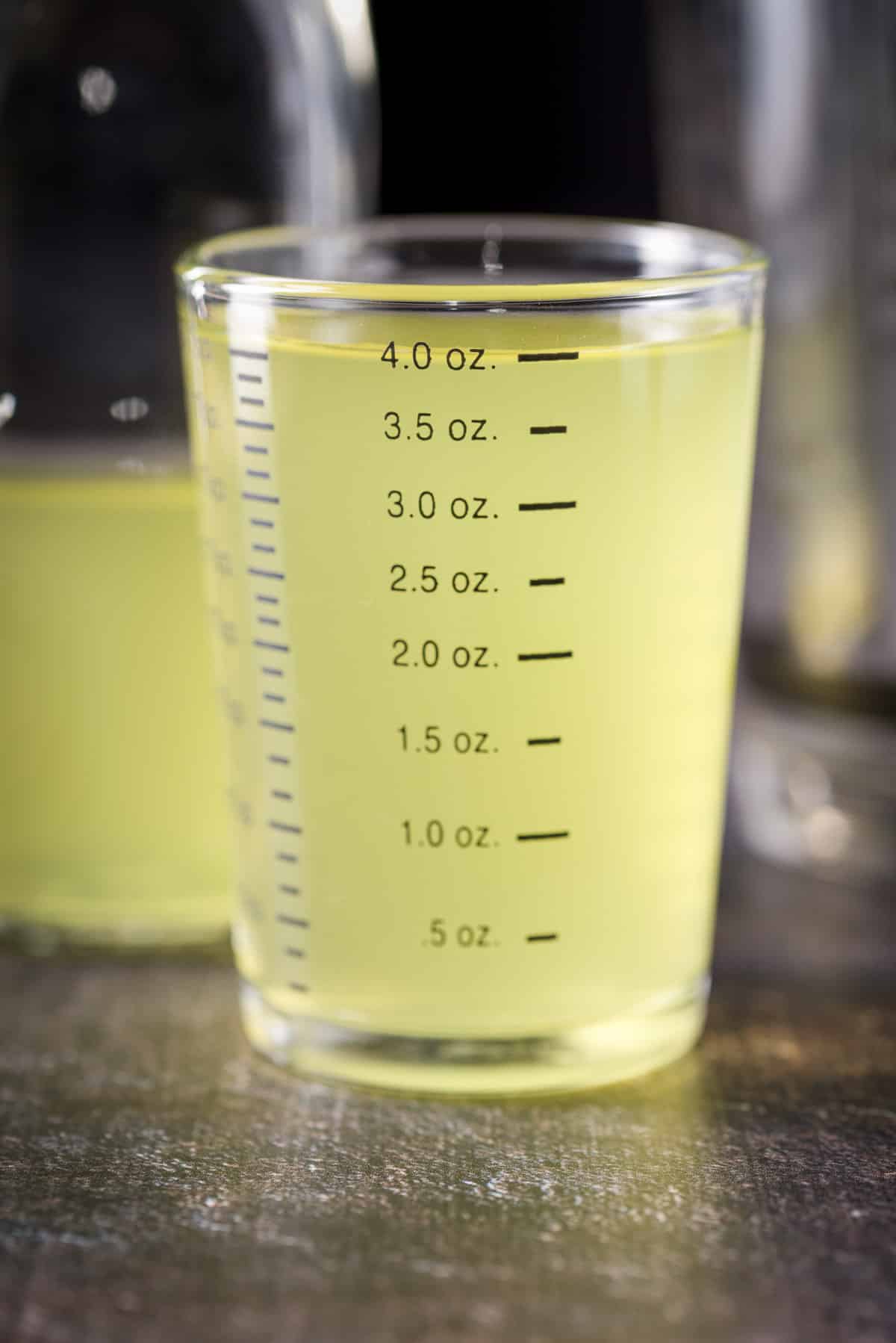 Orange vodka measured out