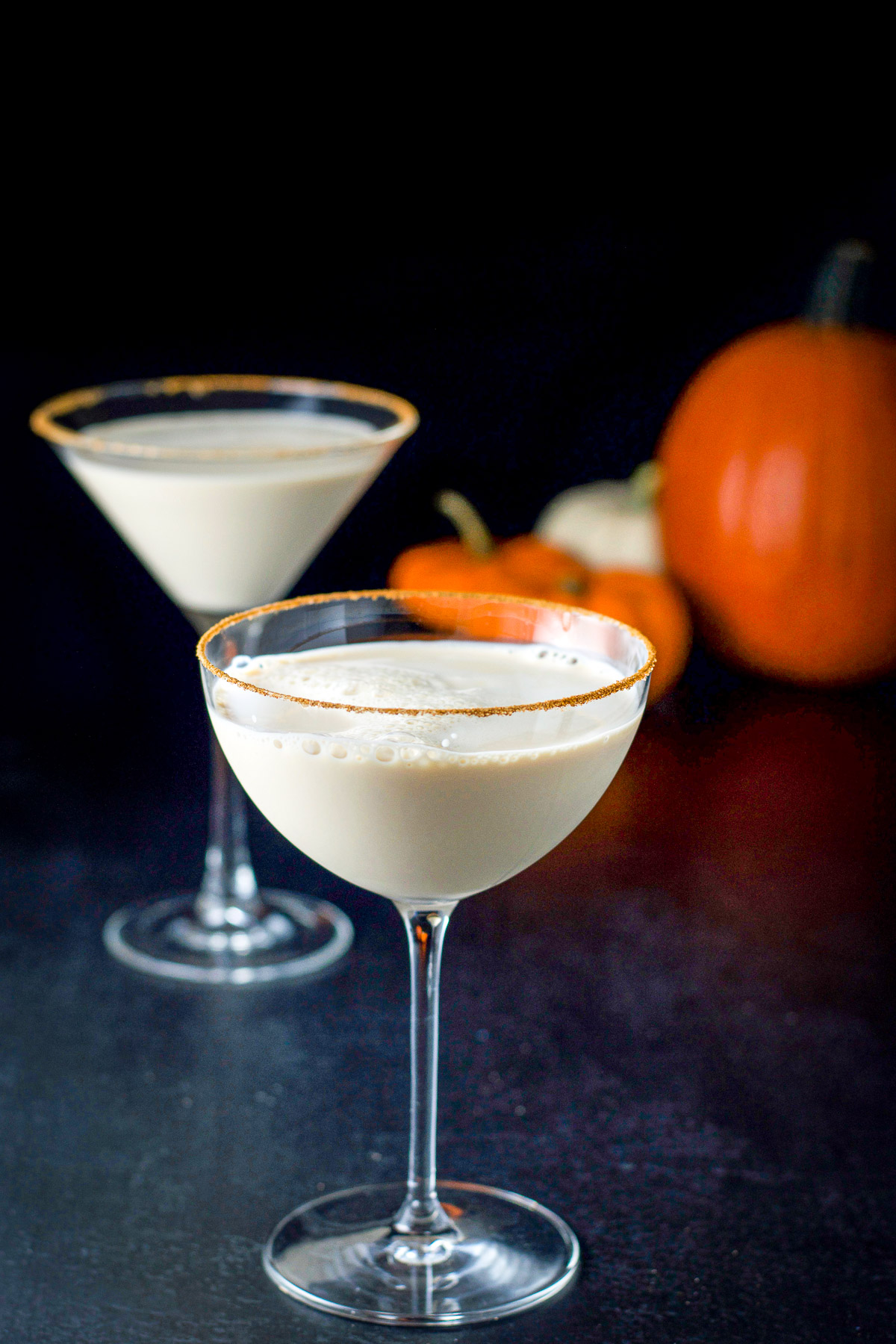 Sugar rimmed glasses filled with the pumpkin martini