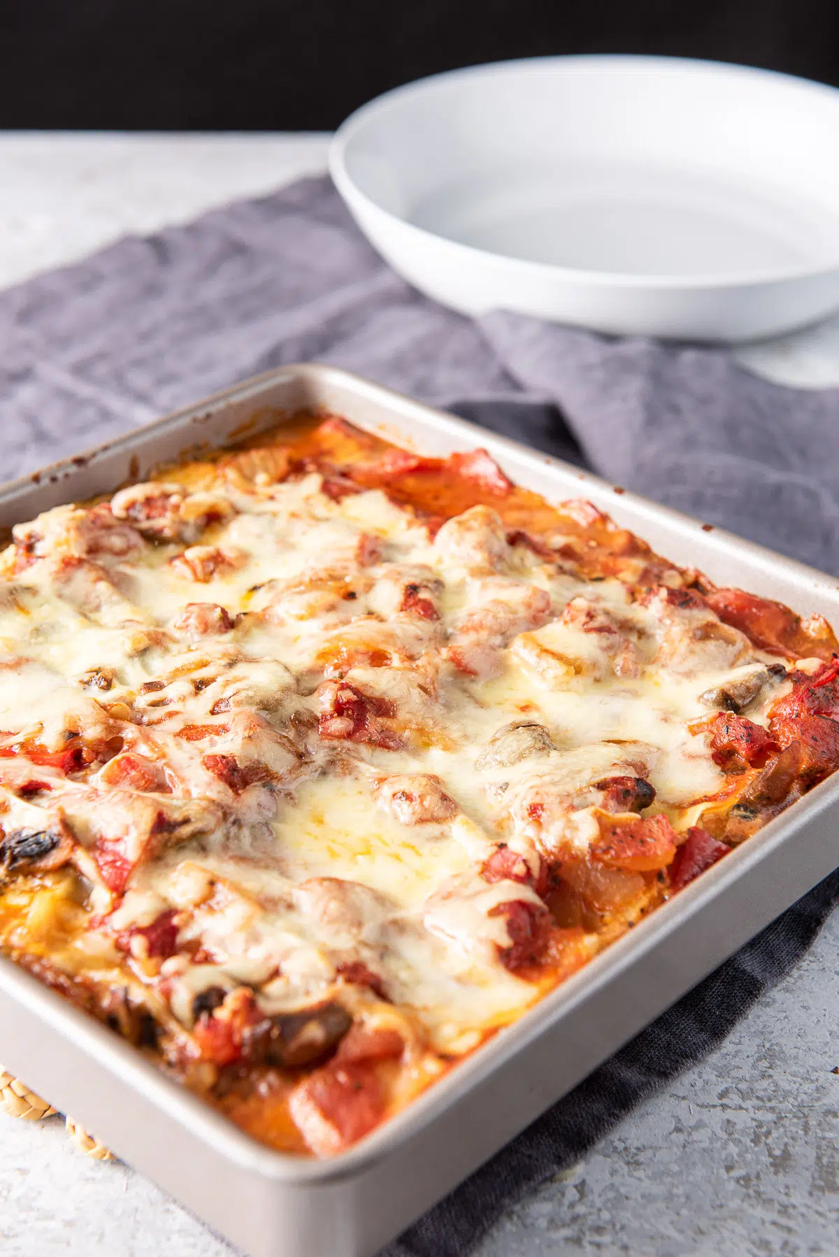 A pan of lasagna straight out of the oven