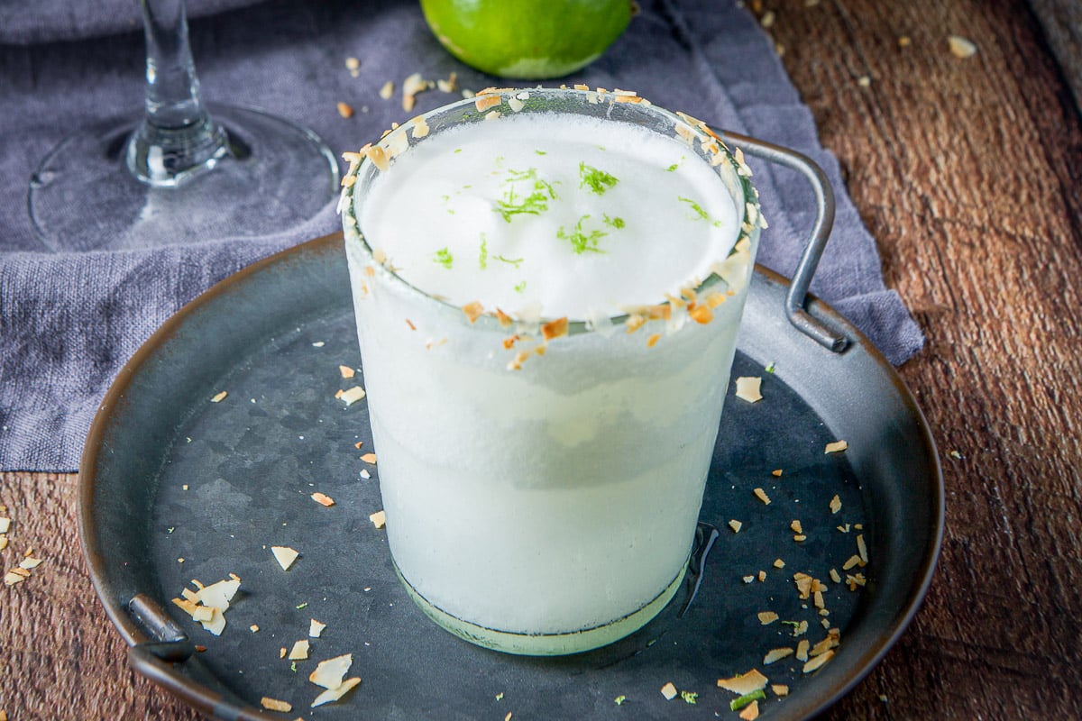 horizontal view of the frozen coconut drink on a little tray