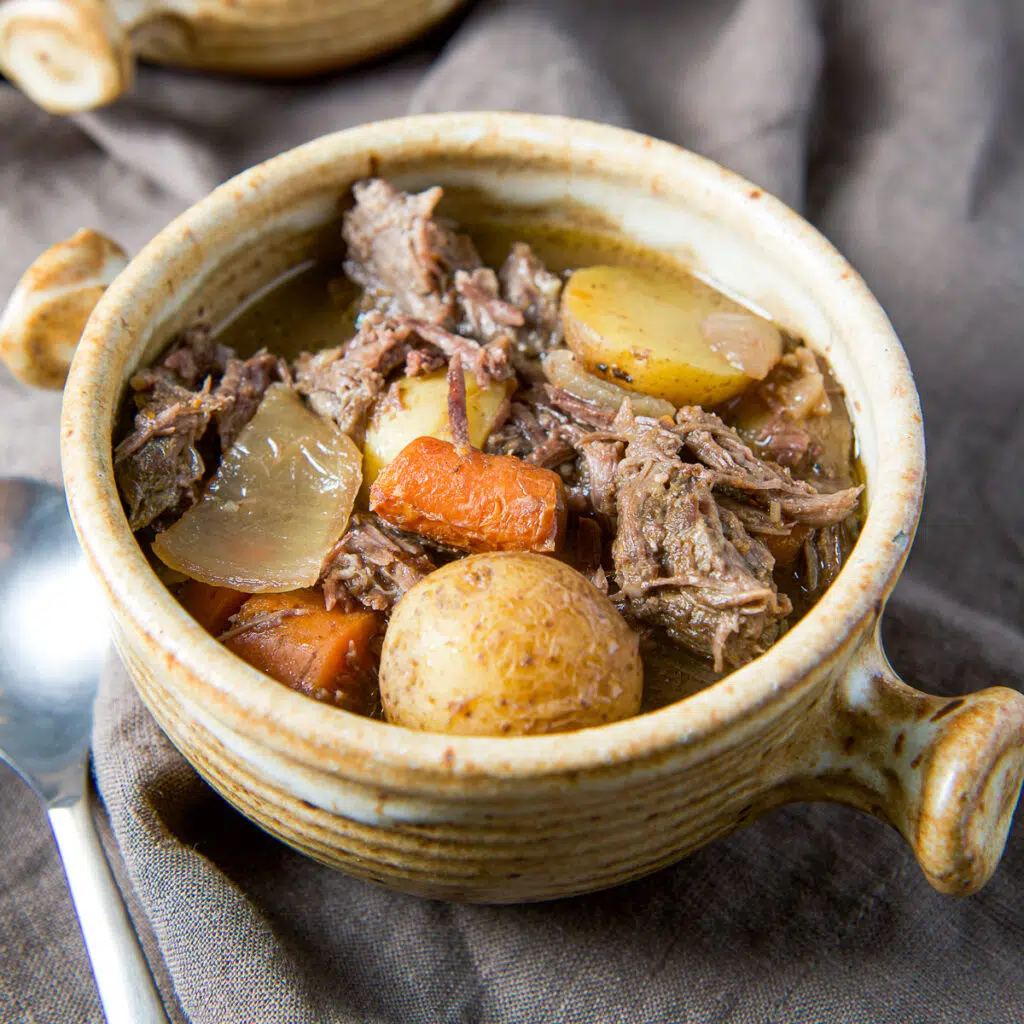 Square view of the pot roast in a crock