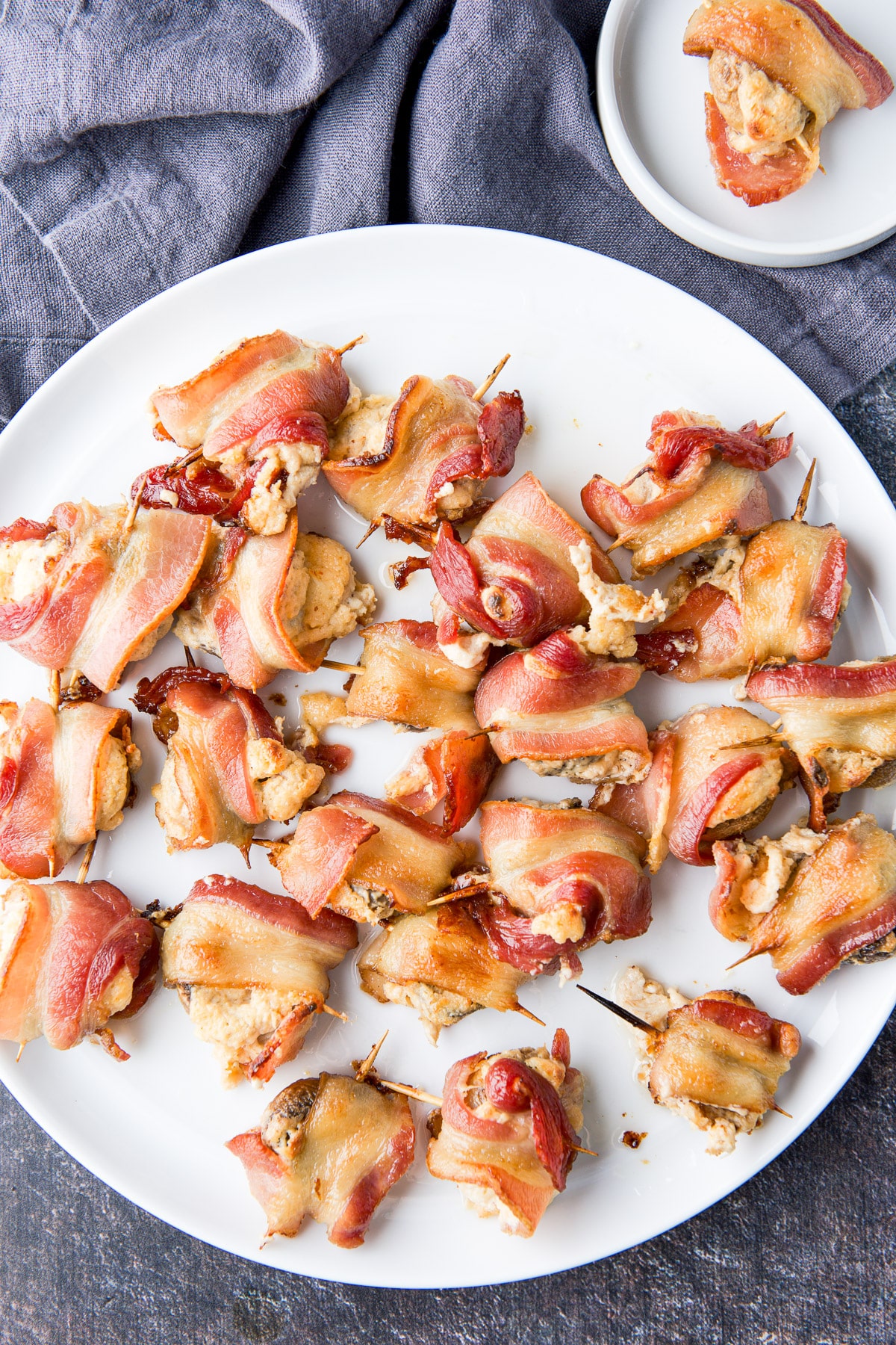 overhead view of the cooked bacon mushroom appetizer on it