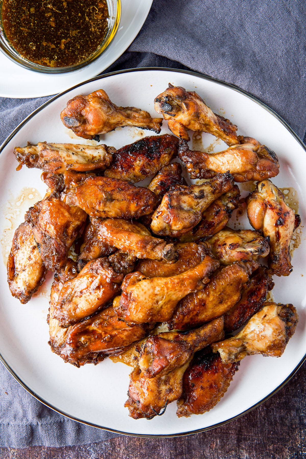 Over head view of the platter of chicken wings and sauce