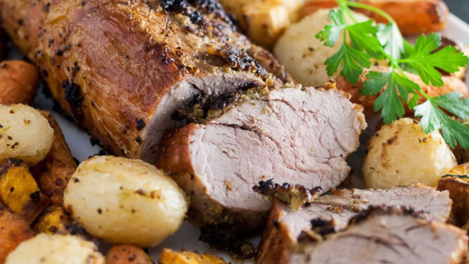 slices of pork with potatoes along with the loin