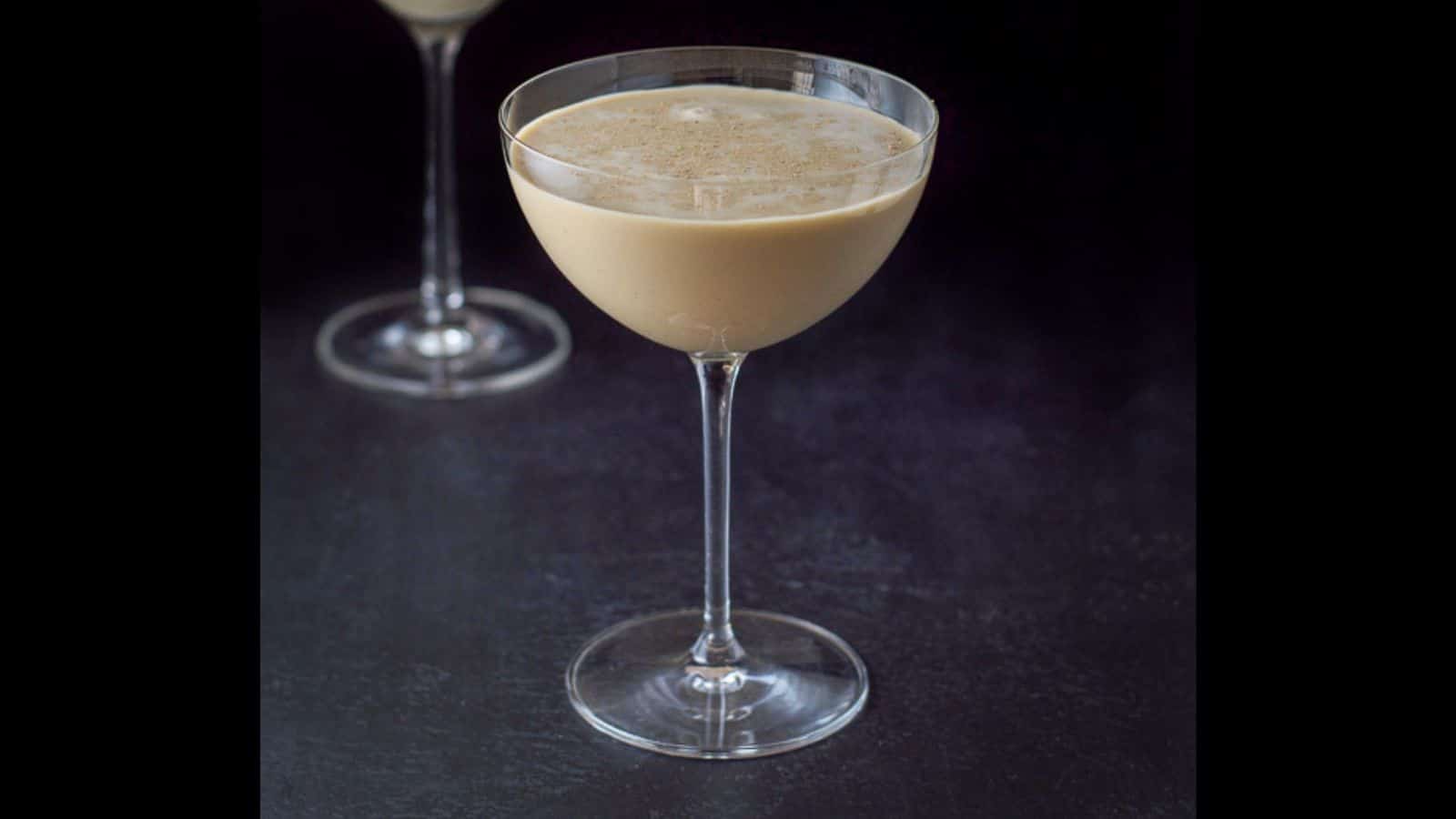 a bowl martini glass filled with the chocolate cream drink