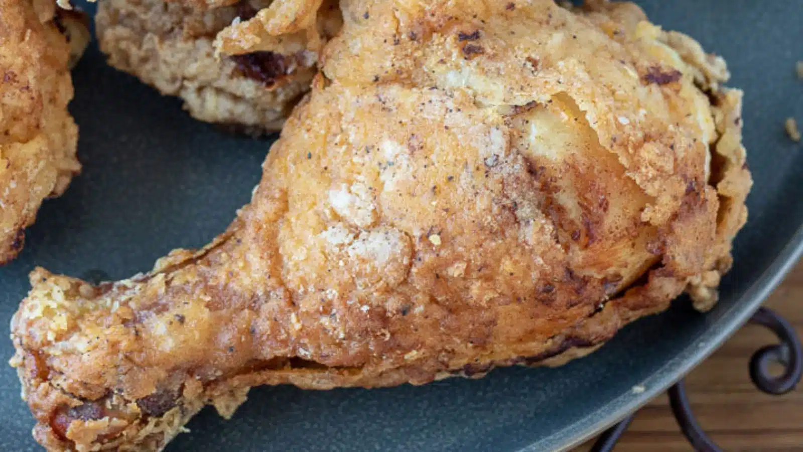Close up of a plate with fried chicken on it