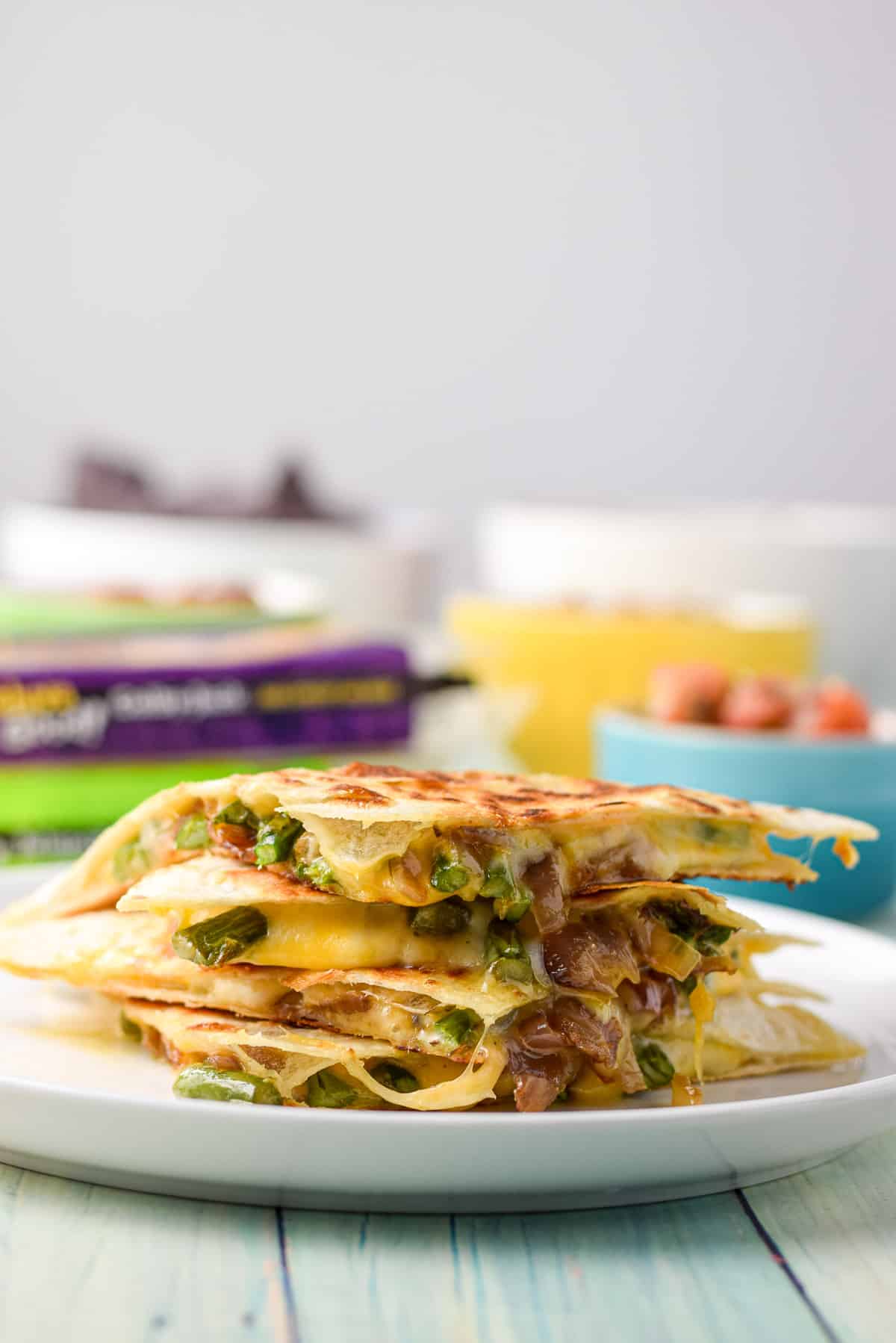 Vertical view of the four quarters of asparagus quesadillas