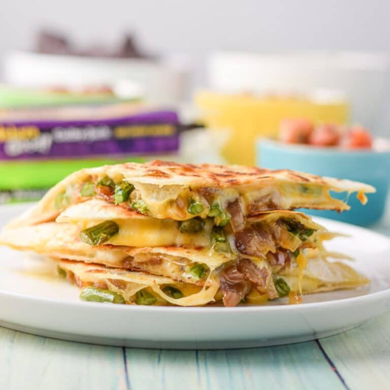 Vertical view of the four quarters of asparagus quesadillas - square