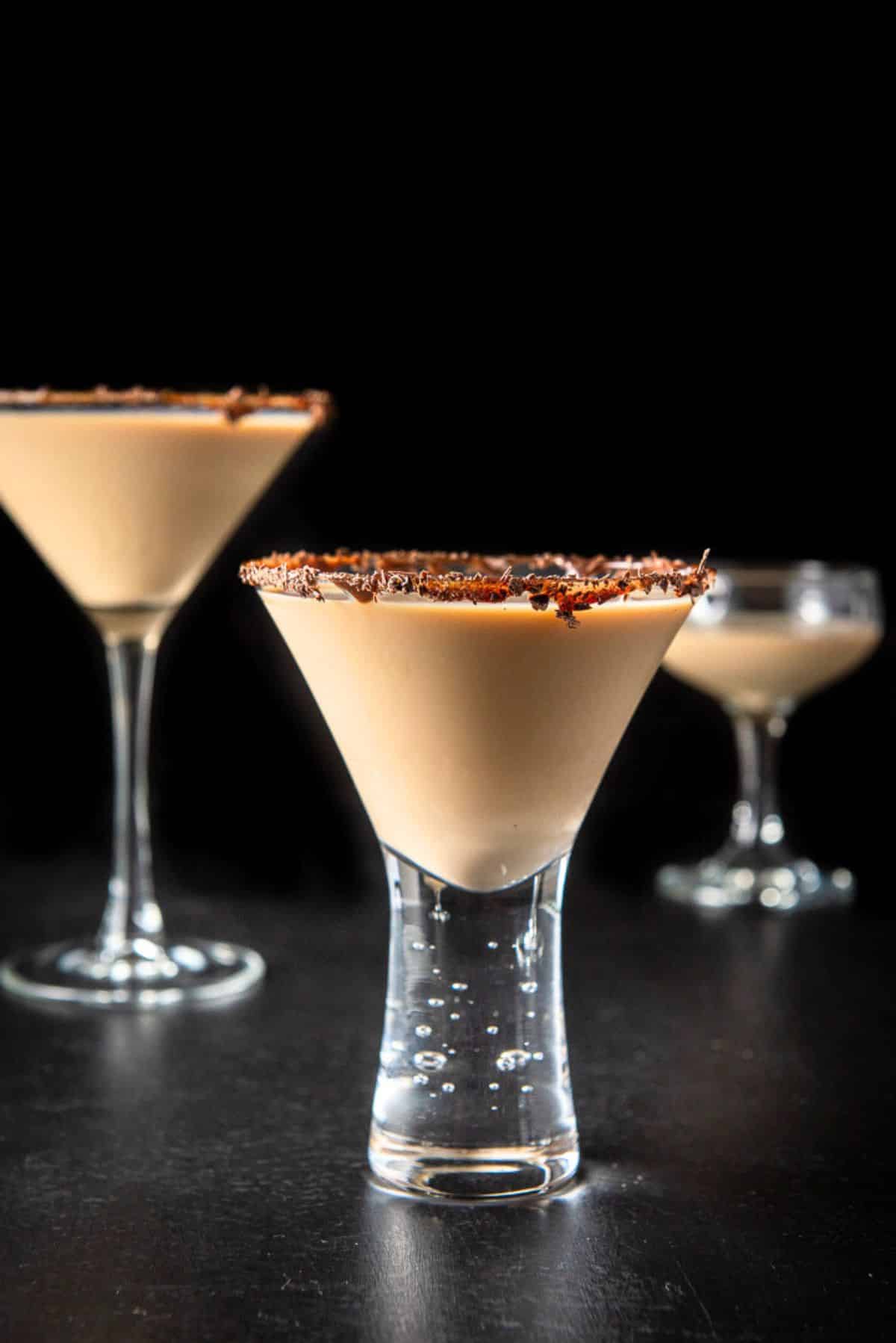 Vertical view of the short glass with the chocolate martini in front of the other glass