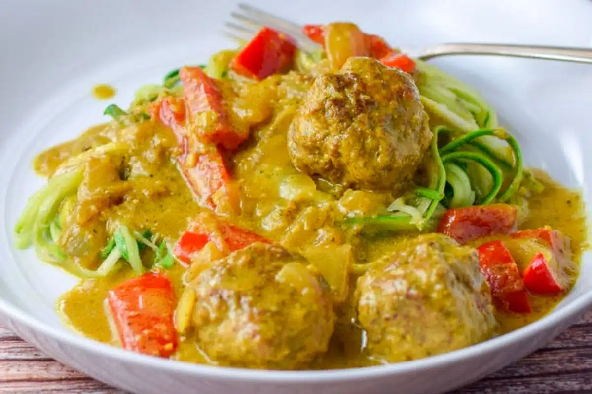 Close up of the a pan with curry meatballs