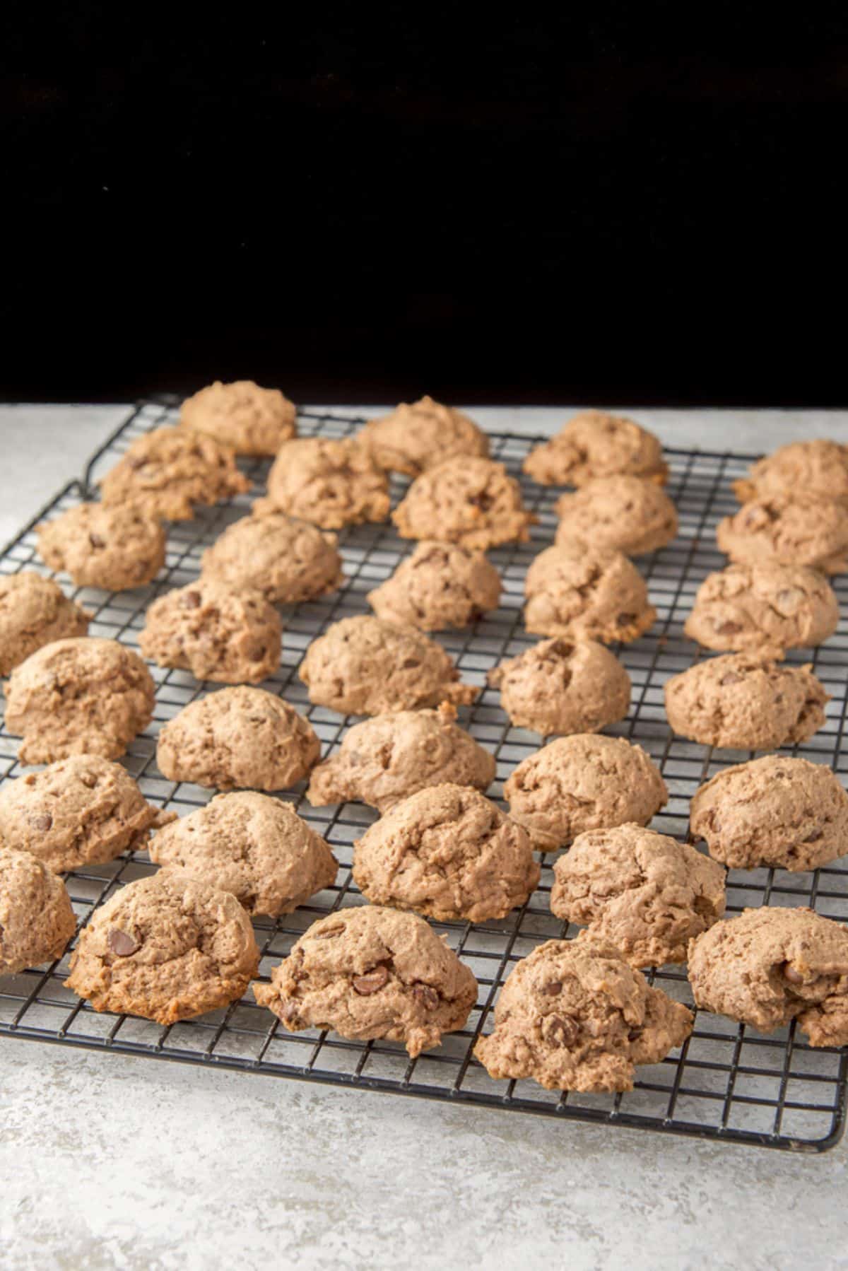 cream cheese cookies cooling on a wire rack