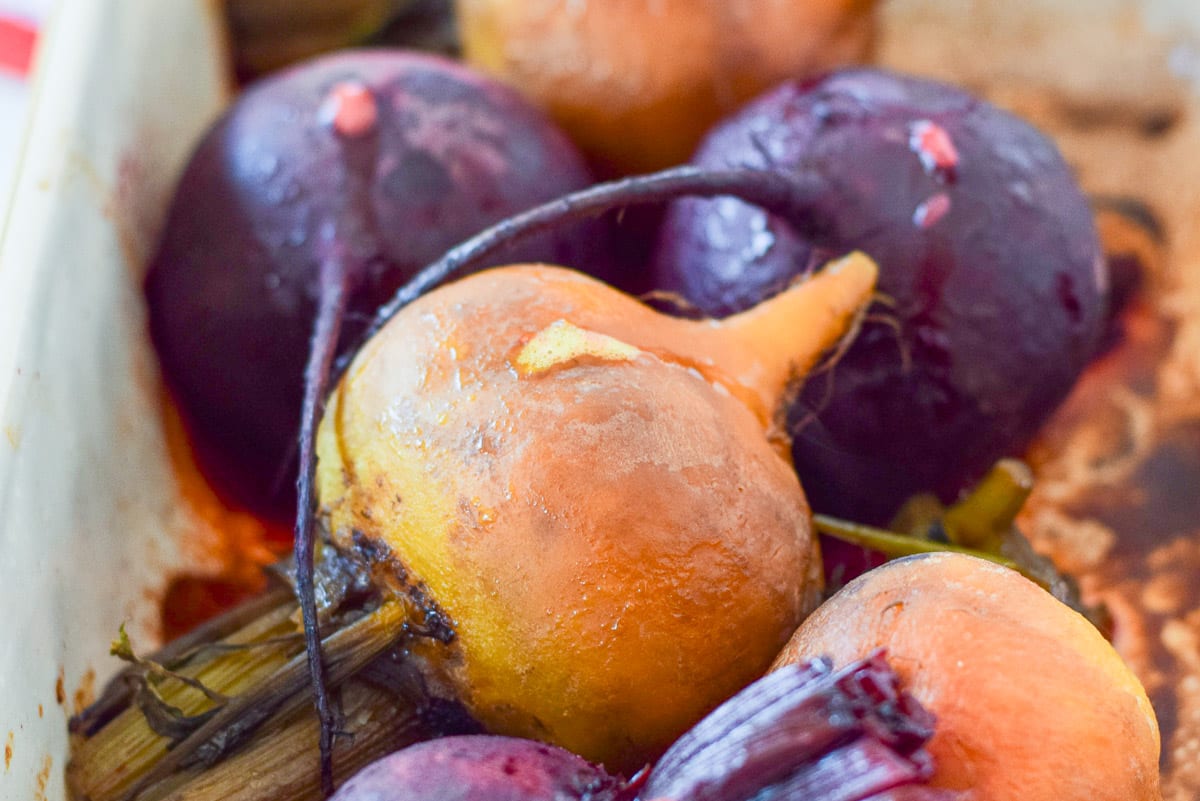 A baking dish with beets straight out of the oven