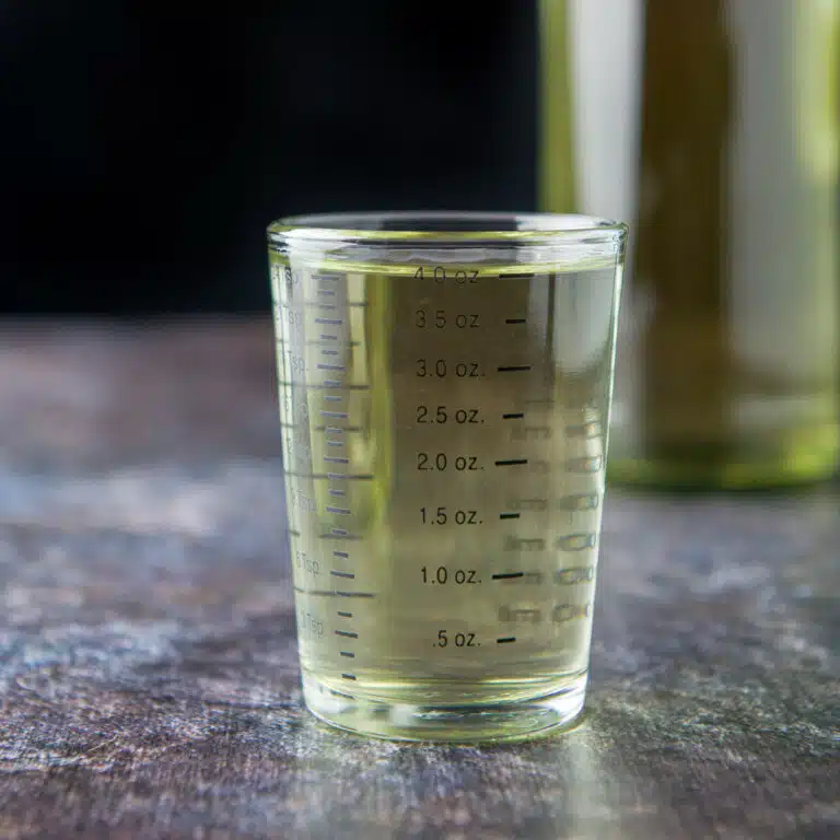 A shot glass filled with the jalapeno vodka