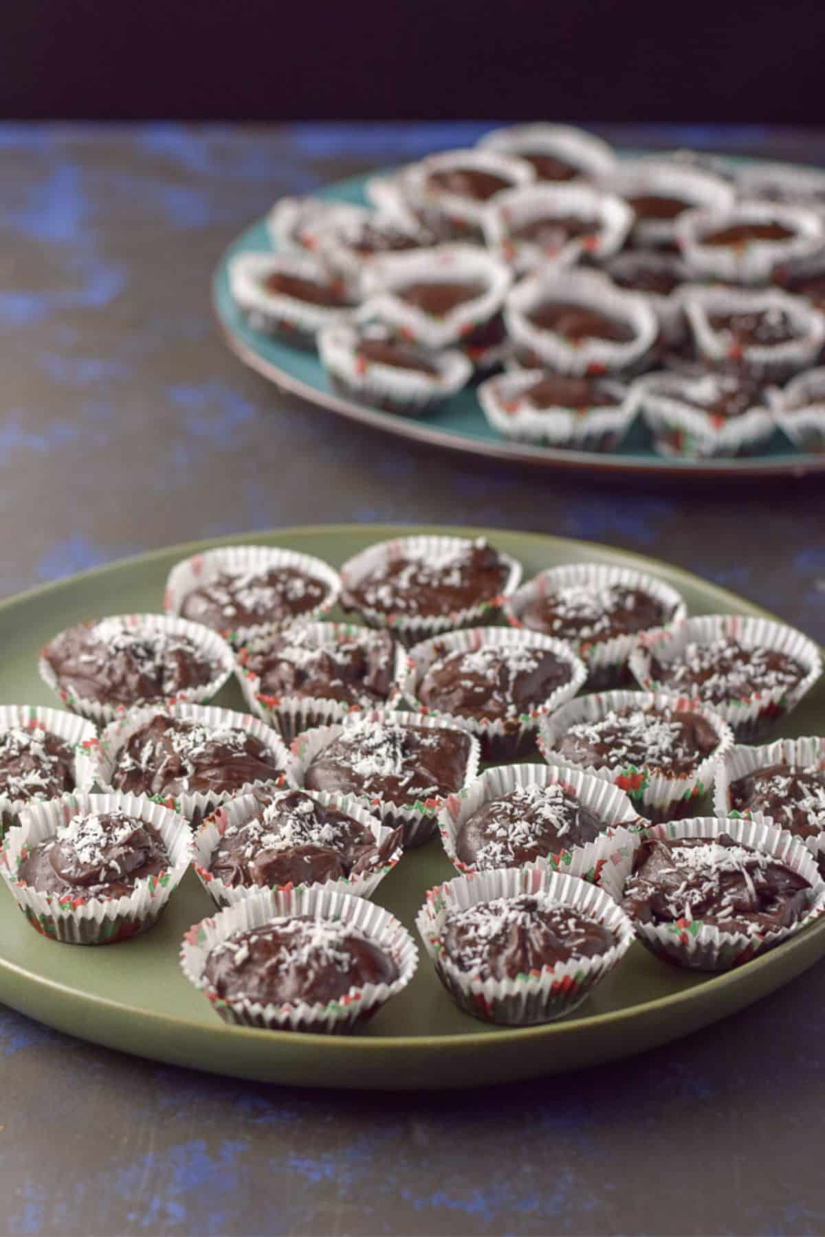 two plates of chocolate truffles ready to be consumed