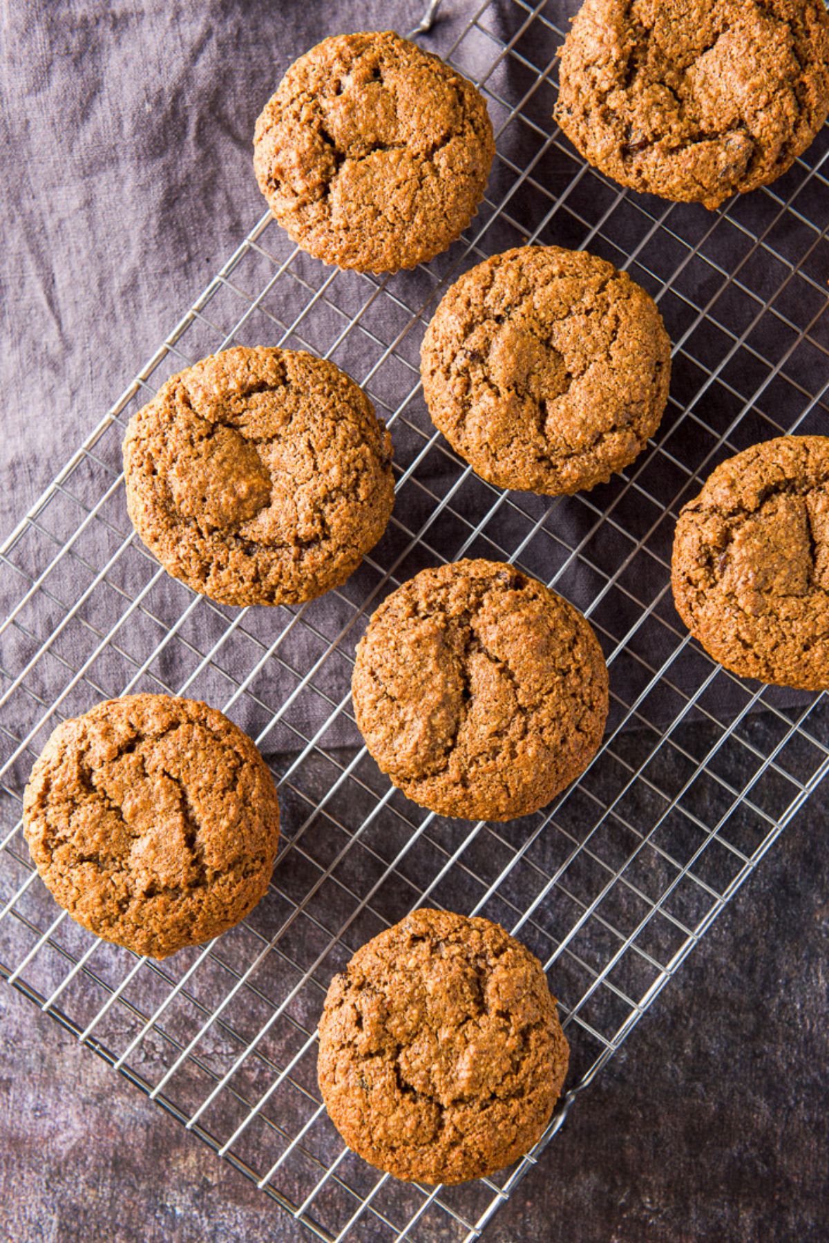 Overhead view of the oat bran muffins on a wire rack