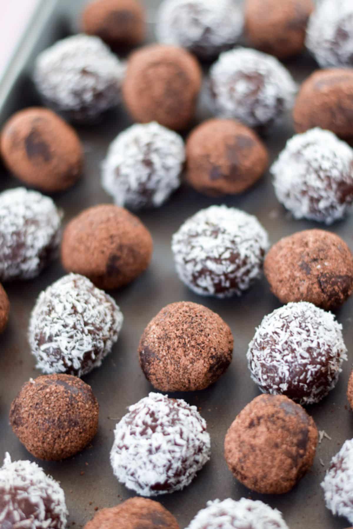 Pan of chocolate balls on a pan and ready for refrigerating